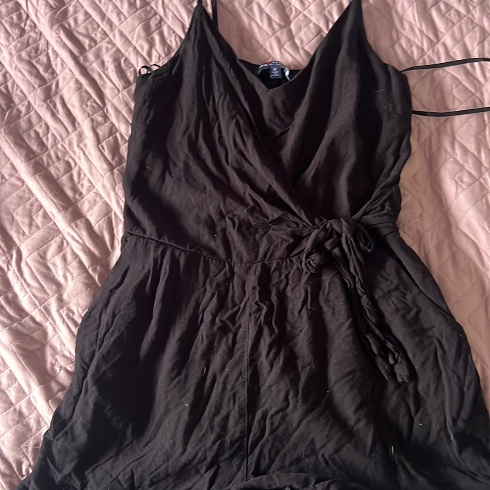 Black romper with a bow